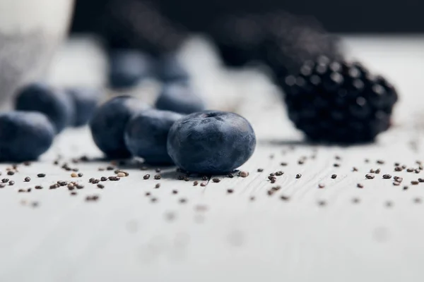 Close View Blueberries Blackberries Scattered Chia Seeds White Wooden Table — Stock Photo, Image