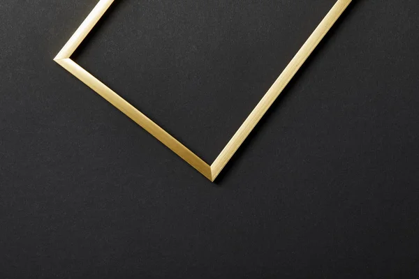 Draufsicht Auf Leeren Goldenen Rahmen Auf Schwarzem Hintergrund Mit Kopierraum — Stockfoto