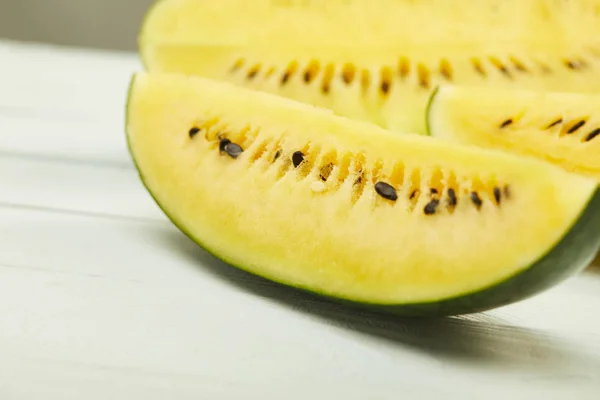Selective Focus Ripe Yellow Tasty Watermelon Seeds White Wooden Table — Stock Photo, Image