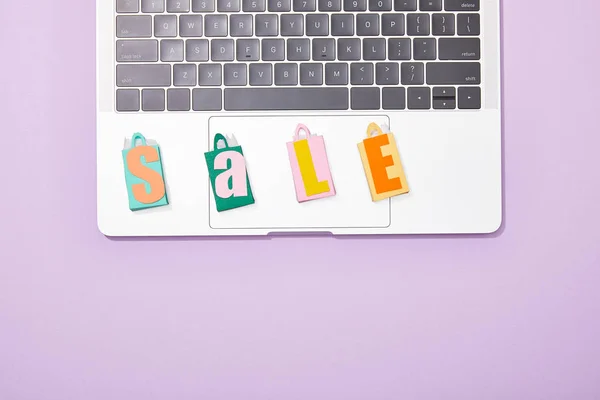 Top View Colorful Toy Shopping Bags Sale Lettering Laptop Violet — Stock Photo, Image