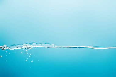transparent pure water with droplets on blue background clipart