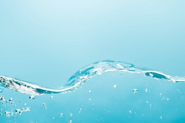 wavy transparent pure water with bubbles on blue background clipart