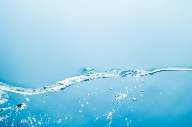 transparent water wave with underwater bubbles on blue background clipart