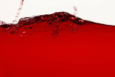 red bright liquid with splash isolated on white clipart
