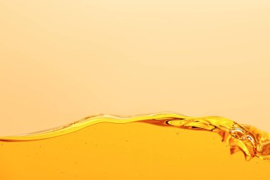smooth yellow bright liquid with wave isolated on yellow clipart