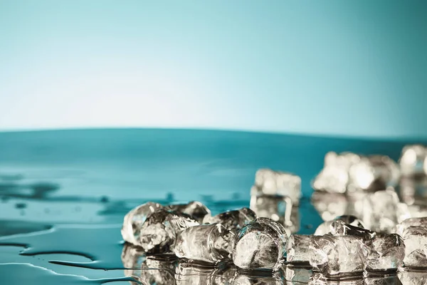 Transparent Melting Ice Cubes Emerald White Background — Stock Photo, Image