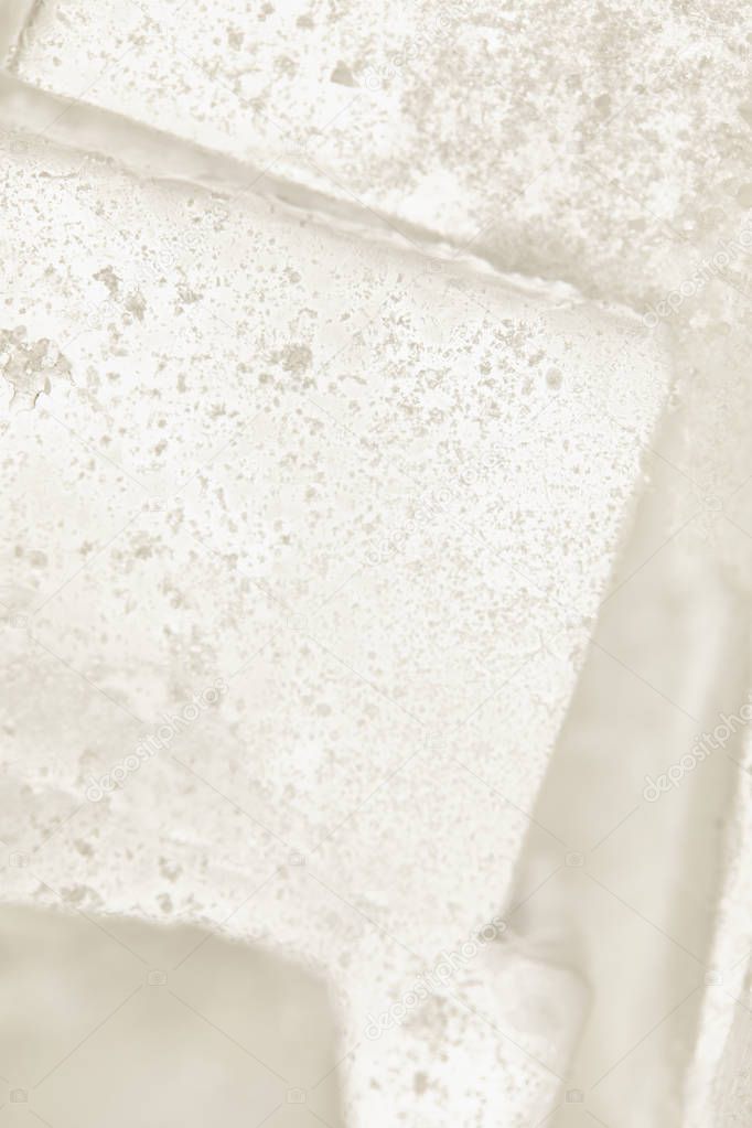 close up view of frozen textured ice cubes