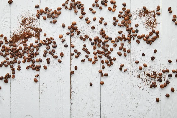 White Wooden Surface Scattered Coffee Beans Ground Coffee — Stock Photo, Image