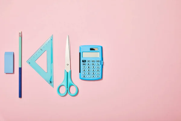 Flat Lay Blue School Supplies Isolated Pink Copy Space — Stock Photo, Image