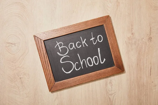 Top View Chalkboard Back School Lettering Wooden Desk — Stock Photo, Image