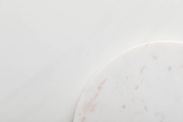 Clean light round marble surface on white background