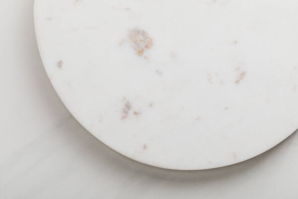 Empty clean round marble surface on white background