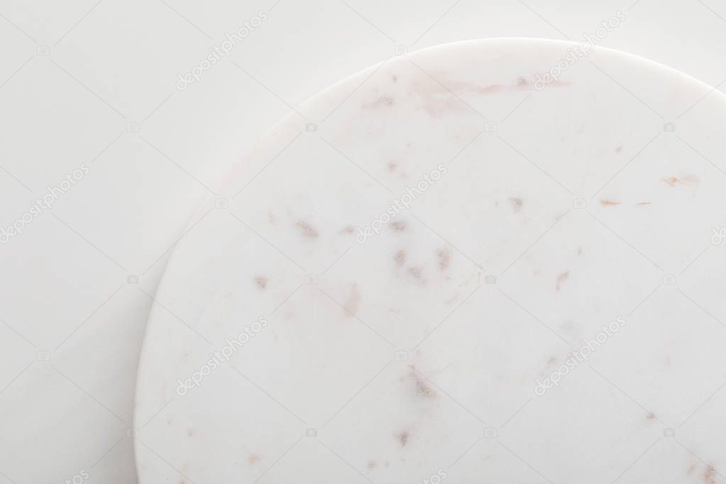 Empty clean light round marble surface on white background