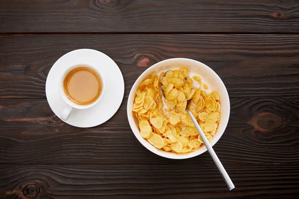 Top View Bowl Cornflakes Milk Cup Coffee Wooden Surface — Stock Photo, Image