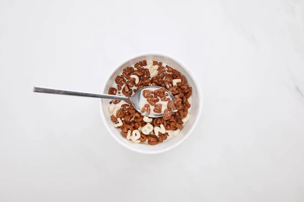 Top View Bowl Chocolate White Cereal Milk Spoon Marble Surface — Stock Photo, Image