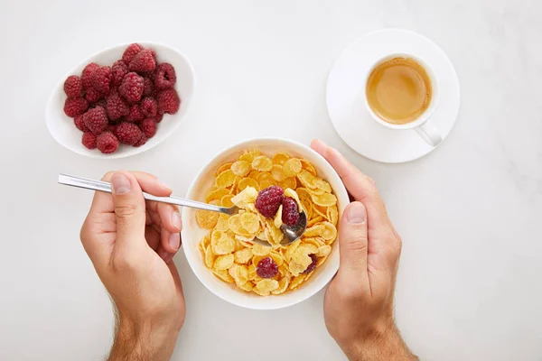 Cropped Image Man Holding Bowl Cornflakes Plate Raspberry Cup Coffee — Stock Photo, Image