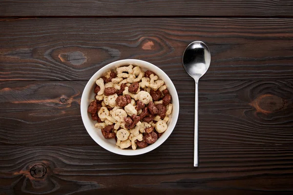 Top View Spoon Cereal Bowl Wooden Surface — Stock Photo, Image