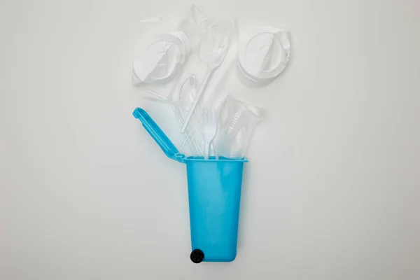 Top View Blue Recycle Bin Crumpled Plastic Cups Forks Spoons — Stock Photo, Image