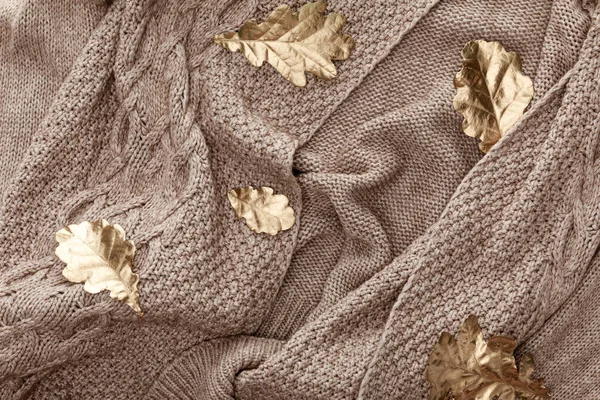 Top View Knitted Brown Sweater Golden Painted Leaves — Stock Photo, Image