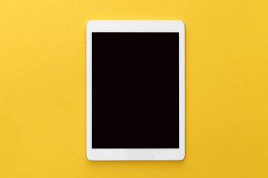 top view of digital tablet with blank screen on yellow background clipart