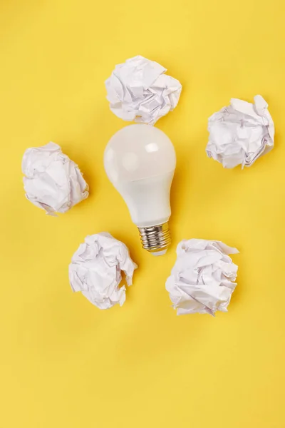 Top View Crumpled Paper Light Bulb Yellow Background — Stock Photo, Image