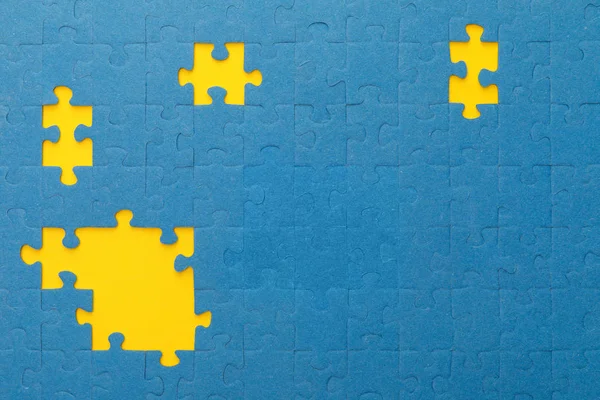 Top View Blue Jigsaw Puzzle Yellow Gaps — Stock Photo, Image