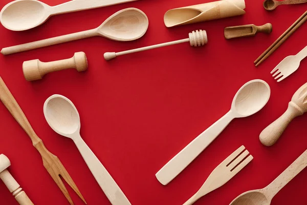 Top View Spoons Forks Chopsticks Kitchenware Red Background Copy Space — Stock Photo, Image