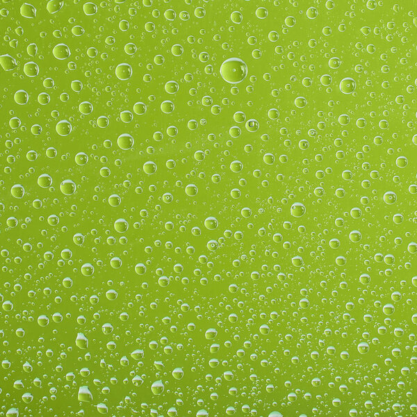 clear transparent water drops on green background