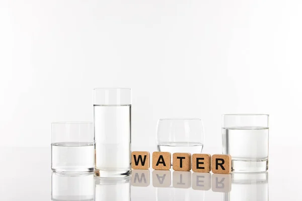 Clear Fresh Water Glasses Cubes Water Lettering Isolated White — Stock Photo, Image