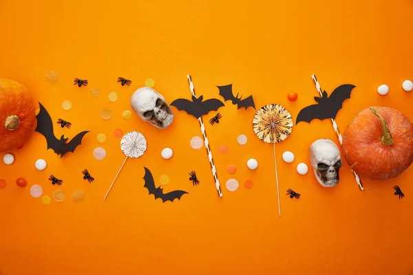 Felső Kilátás Tök Koponyák Denevérek Pókok Konfetti Narancssárga Alapon Halloween — Stock Fotó