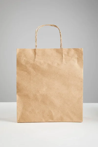 Paper Shopping Bag Isolated Grey Black Friday Concept — Stock Photo, Image