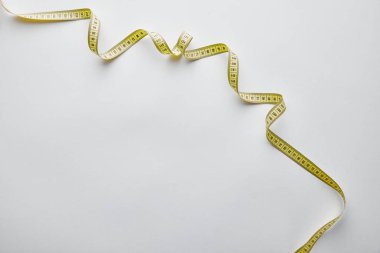 top view of measuring tape on white with copy space clipart