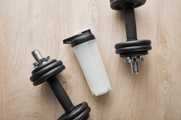 Top View Sports Bottle Heavy Dumbbells Wooden Surface — Stock Photo, Image