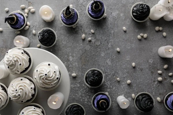 Top View Delicious Halloween Cupcakes Burning Candles Concrete Grey Surface — ストック写真