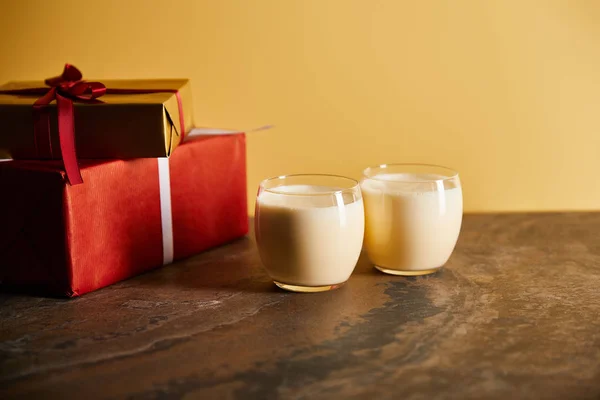 Delicious Eggnog Cocktail Gift Boxes Dark Marble Table Isolated Orange — Stock Photo, Image