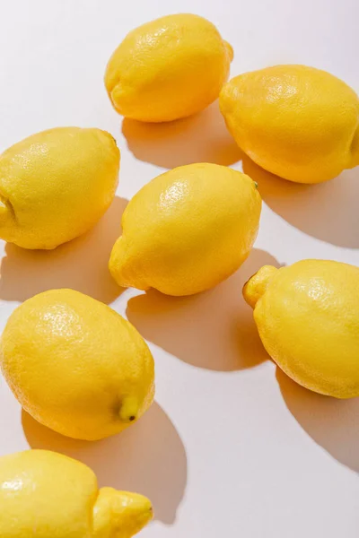 Whole Yellow Lemons Grey Table Shadows — Stock Photo, Image