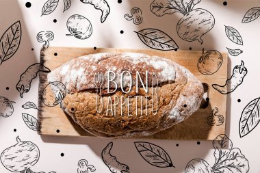 top view of bread on cutting board on grey table with bon appetit lettering and vegetables drawing  clipart