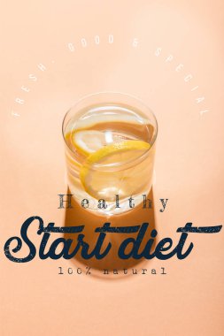 glass of fresh water with lemon slices on beige with fresh, good and special, healthy start diet 100 percents natural lettering  clipart