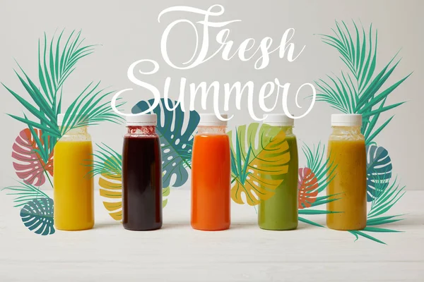 Detox smoothies in bottles standing in row, refresh concept, fresh summer inscription — Stock Photo