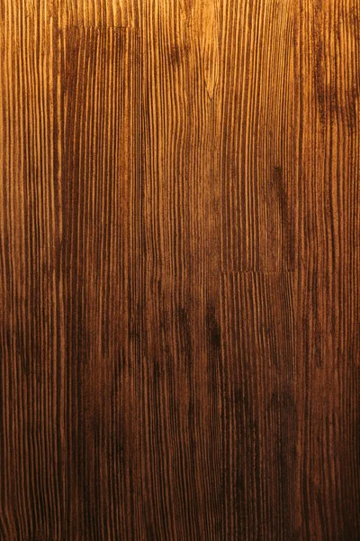 Close-up view of dark brown wooden textured background — Stock Photo