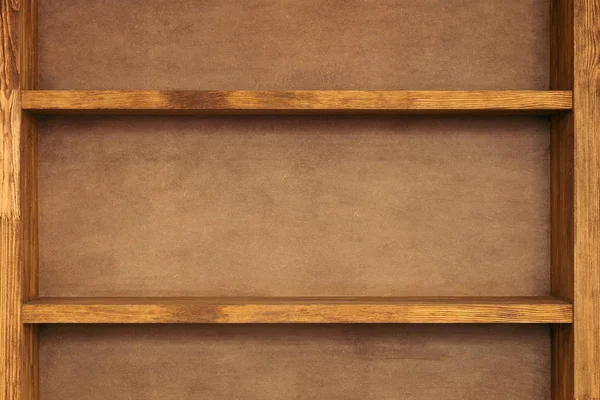 Close-up view of empty wooden shelves background — Stock Photo