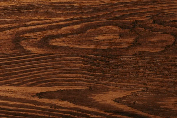 Крупный план темно-коричневого деревянного фона — стоковое фото