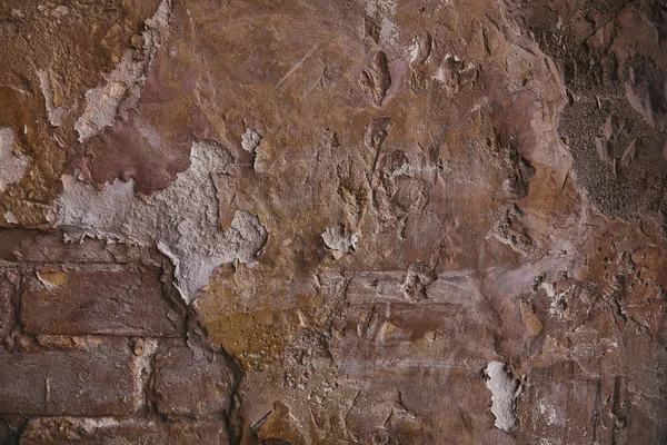 Textura da parede de tijolo danificado para o fundo — Fotografia de Stock