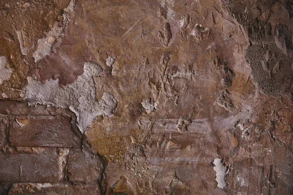 Textura de pared de ladrillo dañado para el fondo - foto de stock