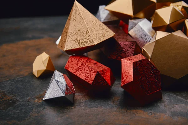 Close-up view of beautiful various shiny faceted minerals on black — Stock Photo