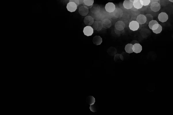Abstrakter dunkler Hintergrund mit silbernem Bokeh — Stockfoto