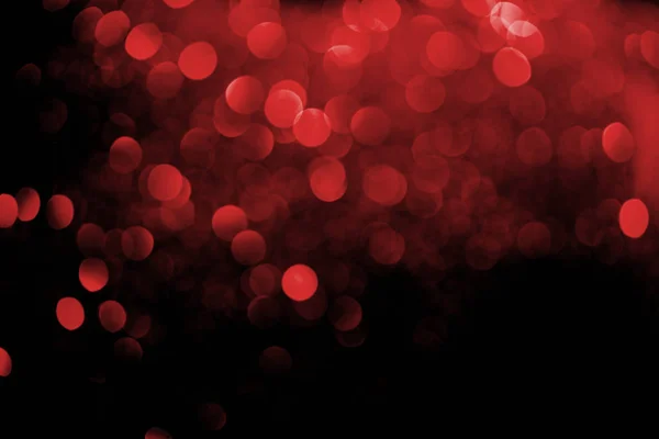 Abstract decorative background with blurred red glitter — Stock Photo
