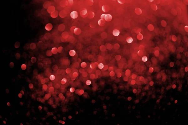Abstract background with blurred glowing red glitter — Stock Photo
