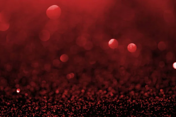 Fond abstrait avec paillettes rouges et bokeh — Photo de stock