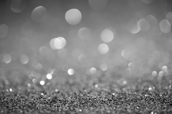 Paillettes d'argent abstraites avec bokeh brillant sur fond — Photo de stock